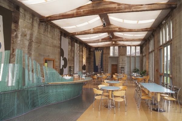 Cafe with tables and chairs.