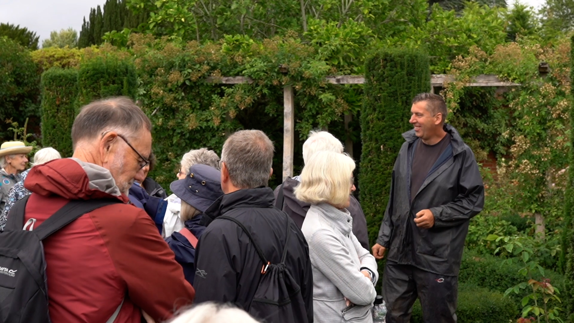 Head Gardener John talking to visitors on a garden tour